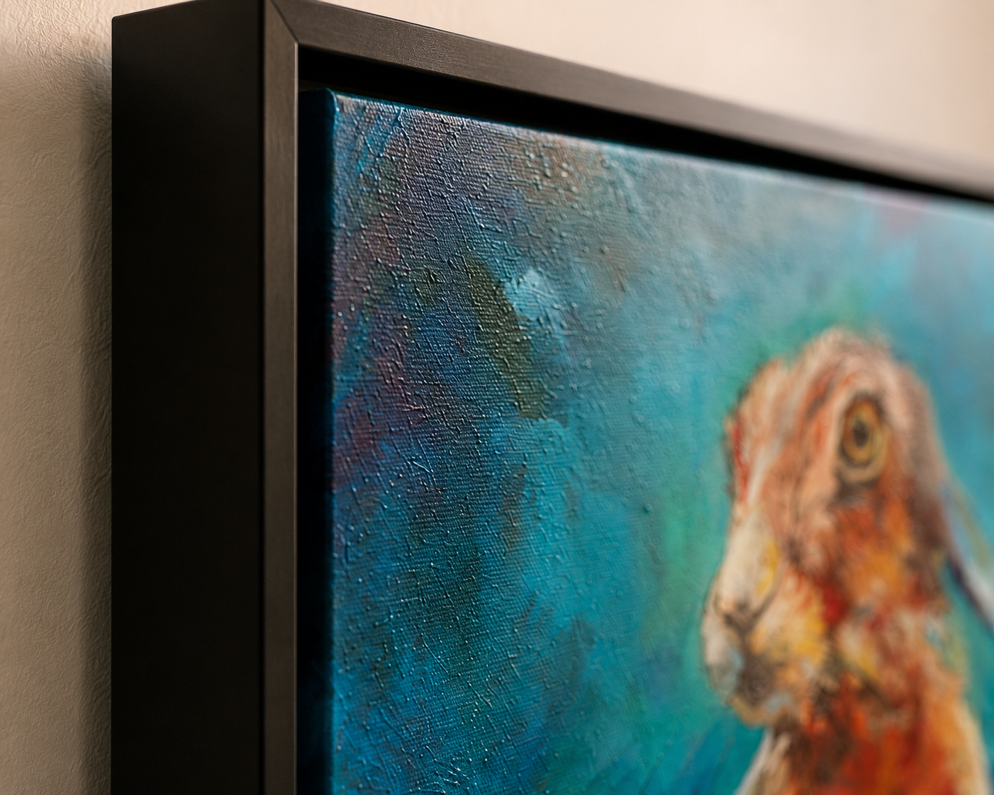 Framed painting of a rabbit with a textured blue background