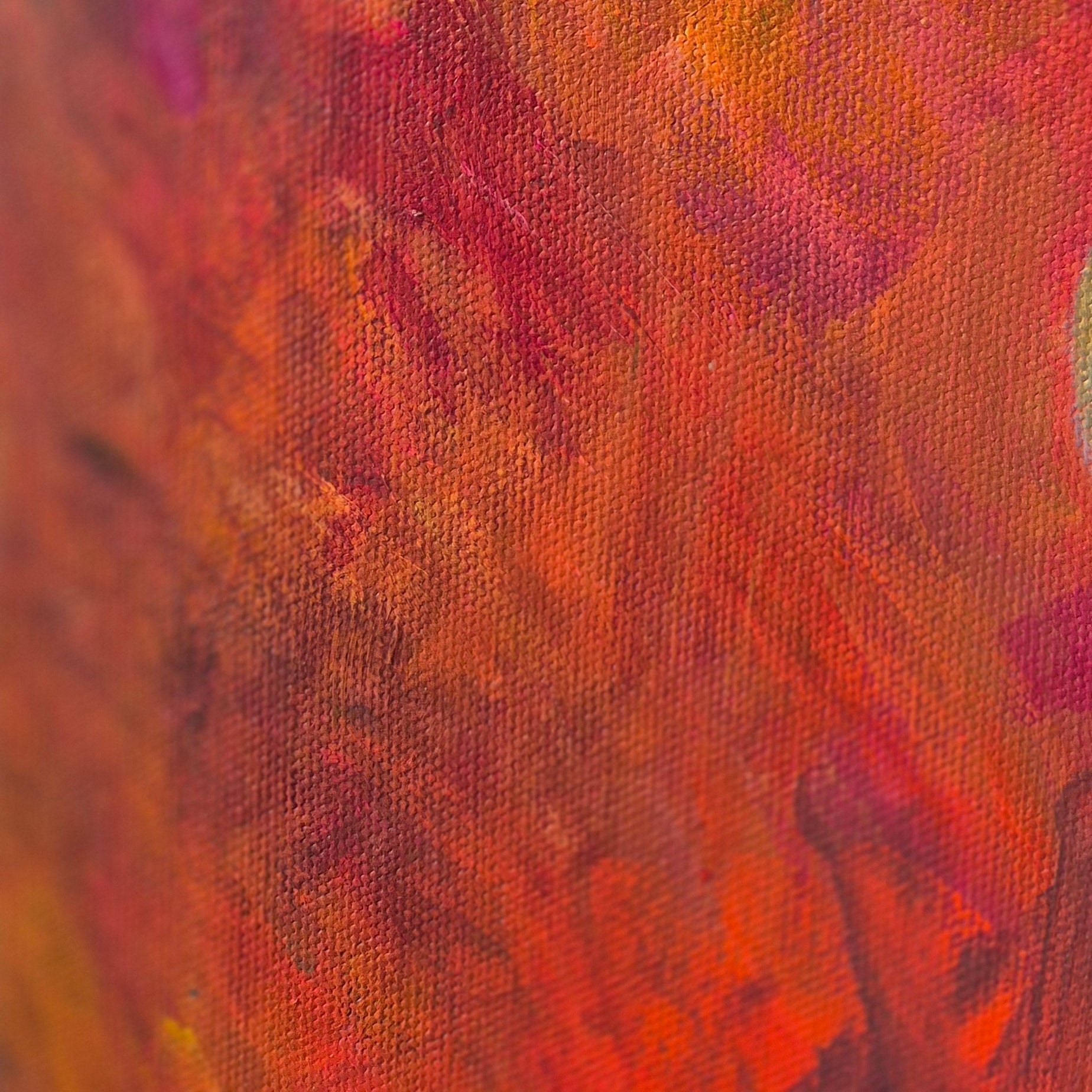 Close-up of textured horse painting with red and orange colors