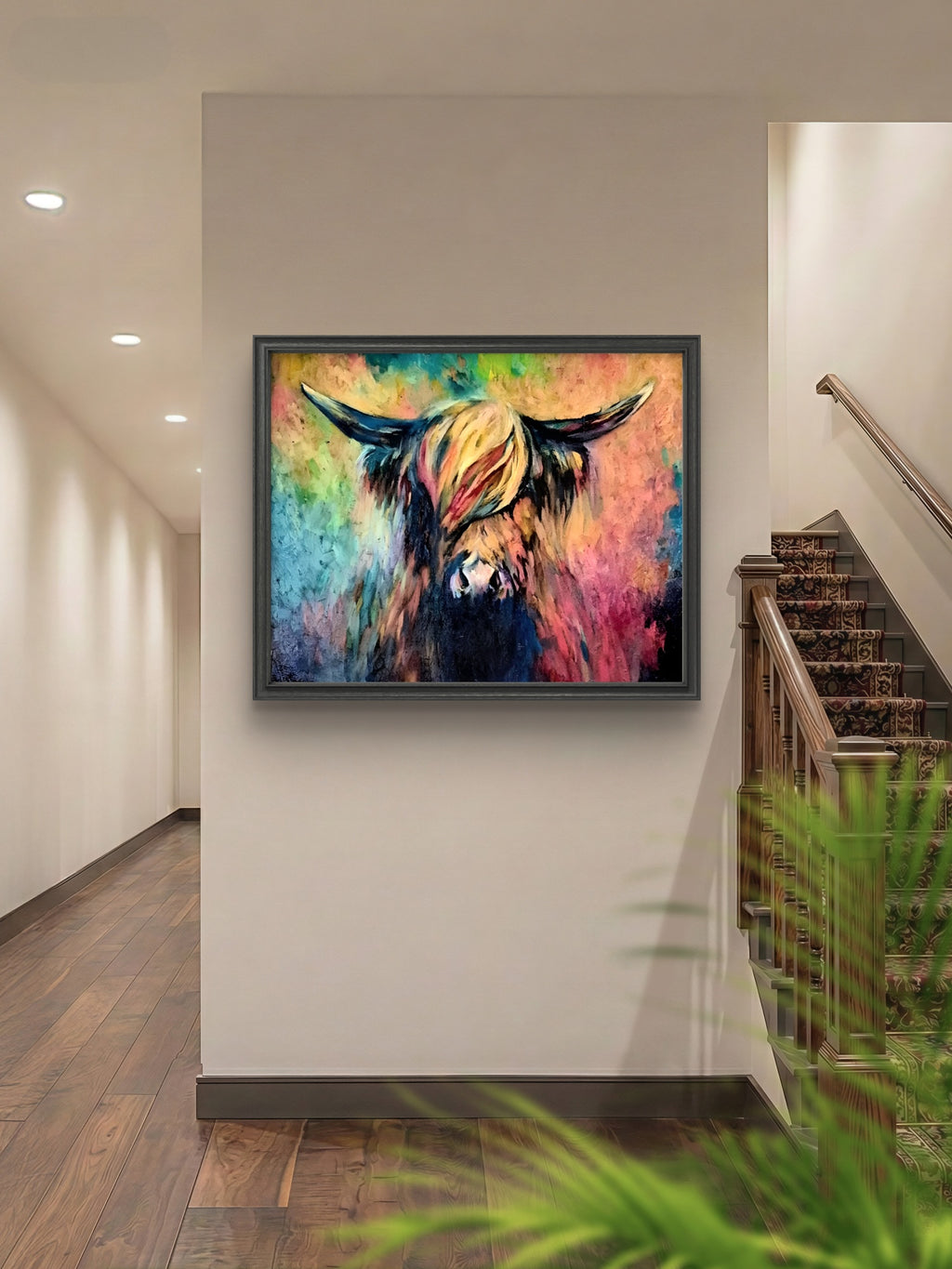 Colorful abstract painting of a bull on a wall in a home setting.