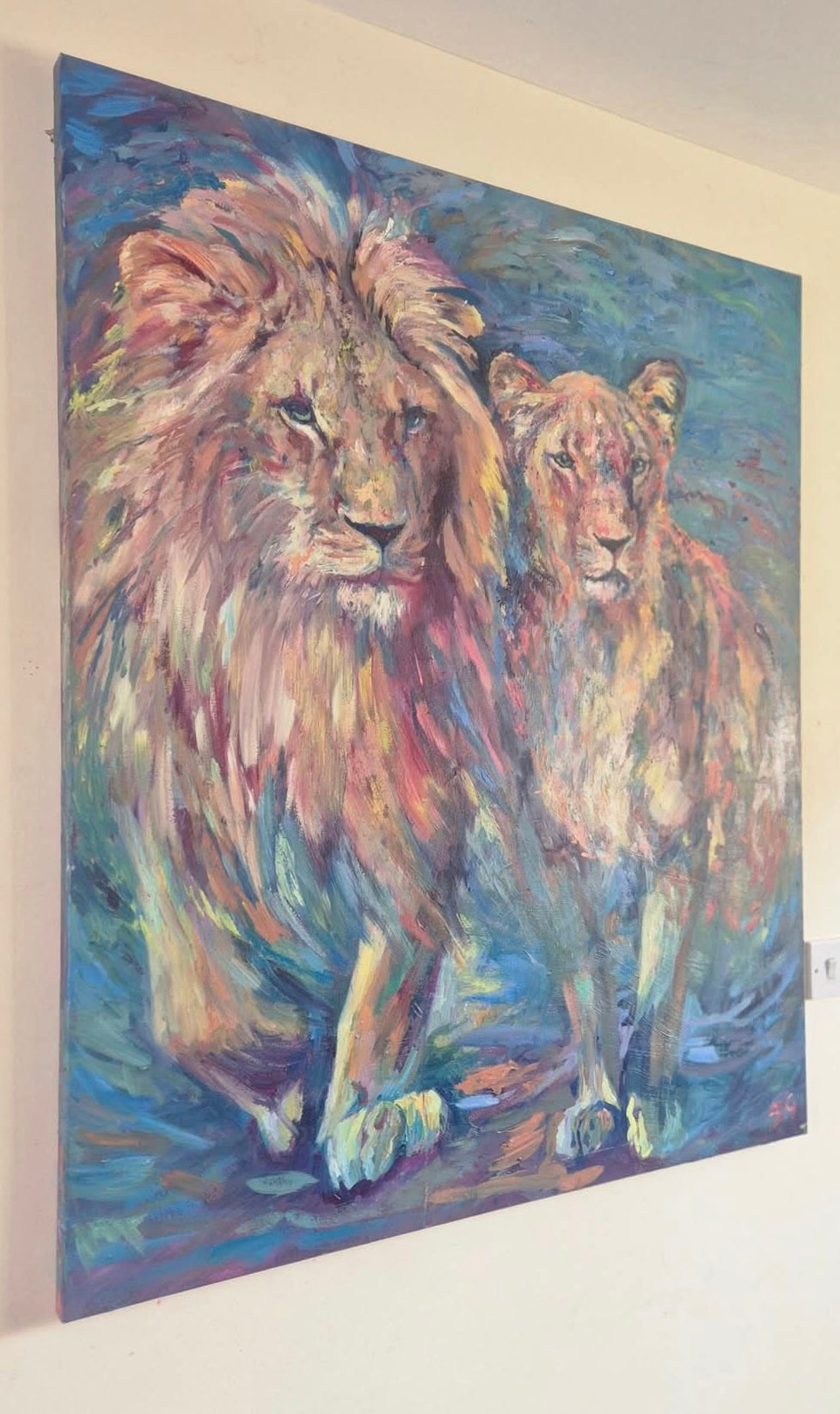 Painting of two lions on a wall