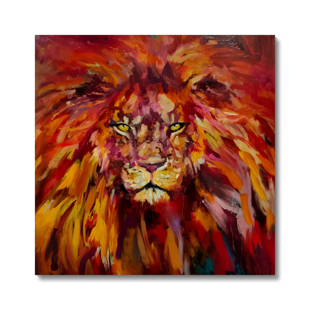 Colorful painting of a lion's face on a white background