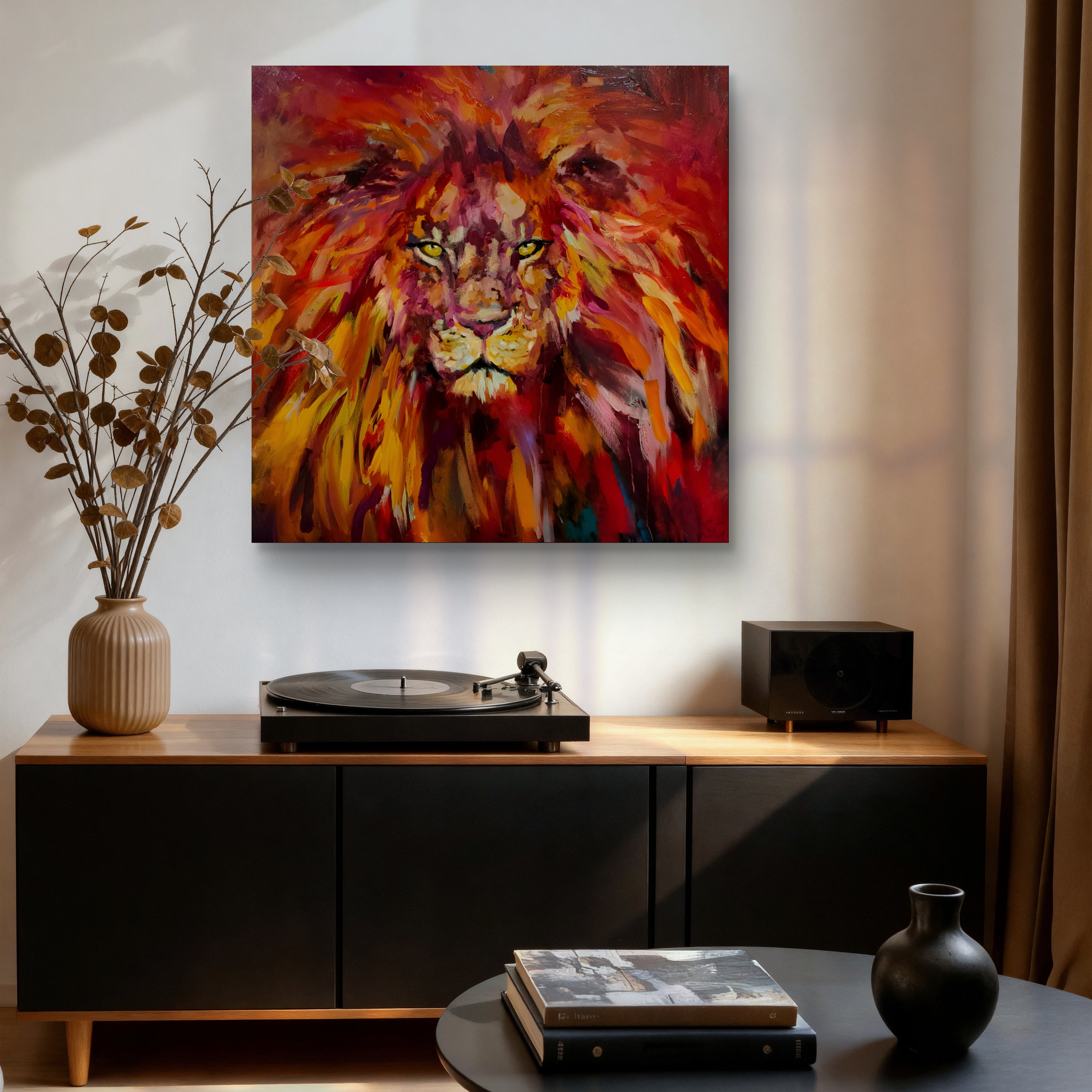 Colorful lion painting above a turntable on a wooden console table.