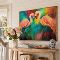 Colorful flamingo painting above a wooden console table with decorative items.