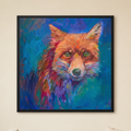 A framed square canvas painting of a fox's head in vibrant blue, purple, orange, and red brushstrokes, displayed on a beige wall above a couch with pillows.