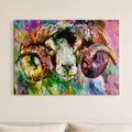 A colorful canvas wall art print depicting a close-up portrait of a ram with textured impasto brushstrokes, hanging on a beige wall above a sofa.