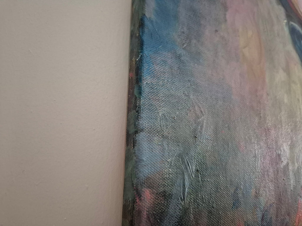 Close-up of a textured oil painting surface with a neutral background