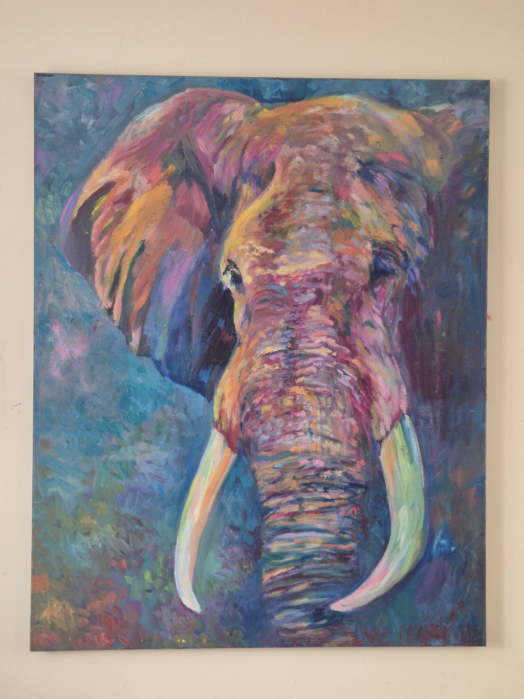 Colorful abstract painting of a elephant with  tusks