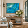 Living room with a large abstract painting, sofa, and decorative items.