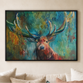 A framed canvas painting of a stag with large antlers, rendered in expressive teal, green, blue, and brown brushstrokes, hanging on a beige wall above a sofa with neutral-toned cushions.