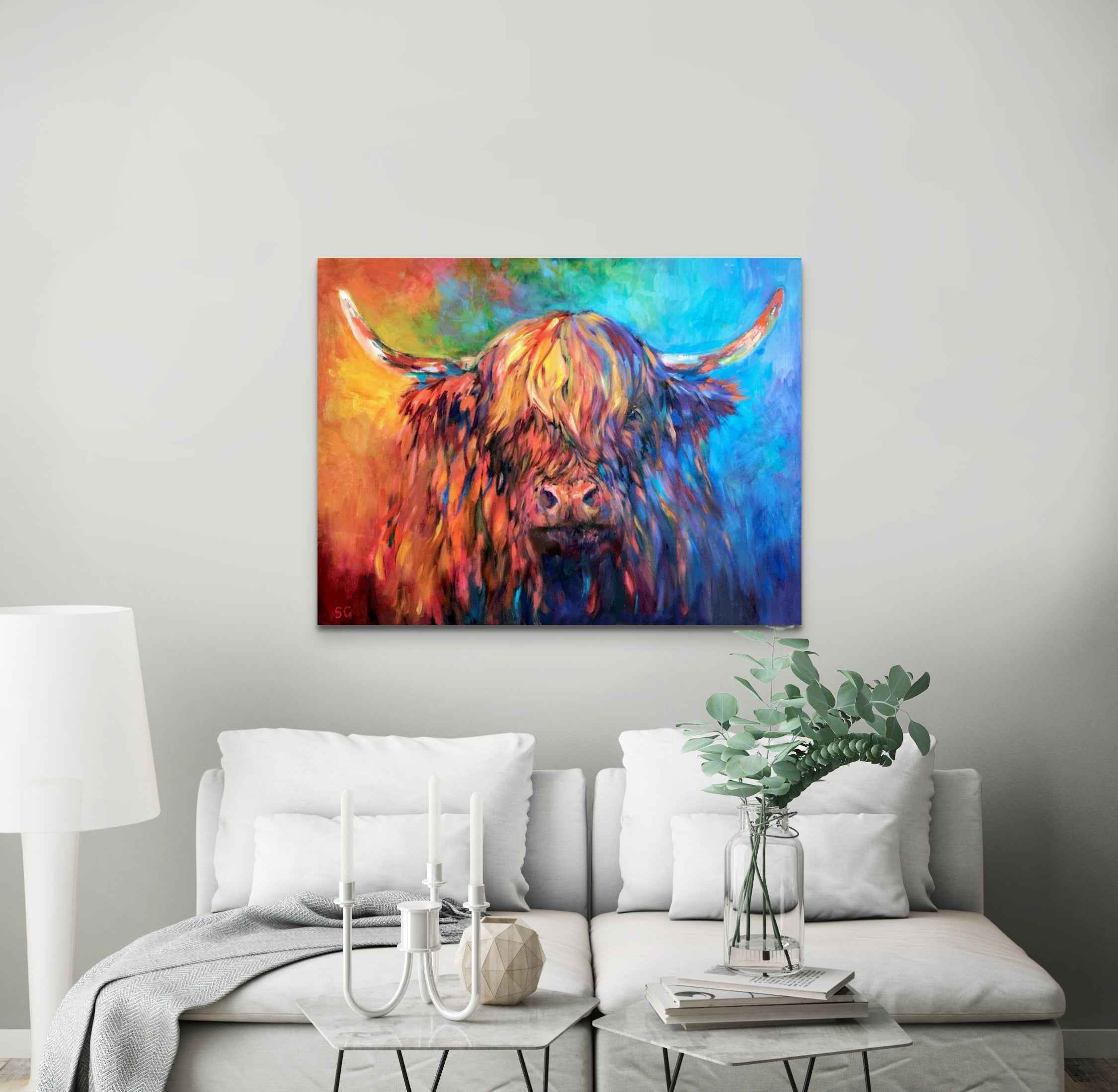 highland cow picture in bright colours in a white room