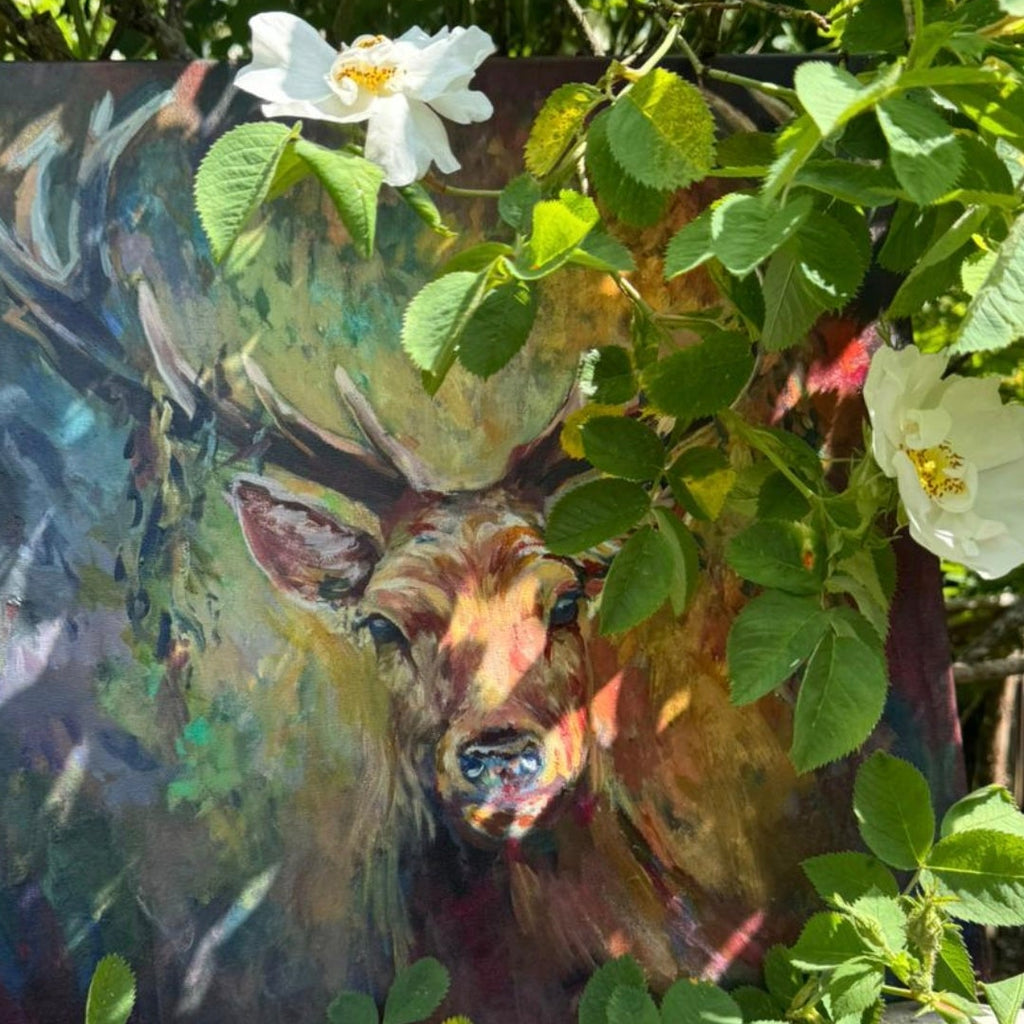 Colorful painting of deer among leaves and flowers